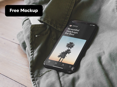 Free iPhone Mockup on Green Jacket clothes free green iphone iphonex jacket mockup nice table