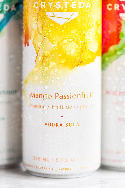 Crysteda Mango Passionfruit art art direction beverage beverage branding brand identity can design graphic design label design labels logo mango vodka soda