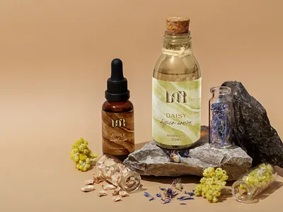 DOR - Essential Oils Branding apple beauty brand clean cosmetics cream daisy design dropper essential flowers font icon identity logo mark oils soap symbol wordmark