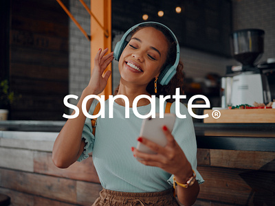 sanarte® Brand Identity brand identity branding clean logo friendly brand happy headphones logo mental health minimalist logo music app logo music branding music logo neutral open pastel pastel colours professional logo smile welcoming logo