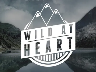 Wild at Heart franchise heart logo man men mountains nature snow white wild