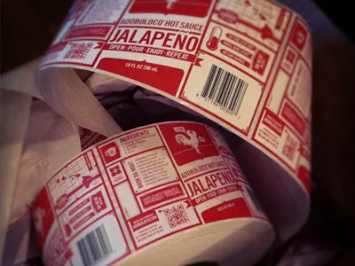 Adoboloco Label Rolls adoboloco hot sauce labels logo maui packaging rooster typography