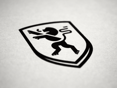 Untitled Lion Project branding crest geometric geometrical geometry lion logo mark paws s shapes shield tail tongue