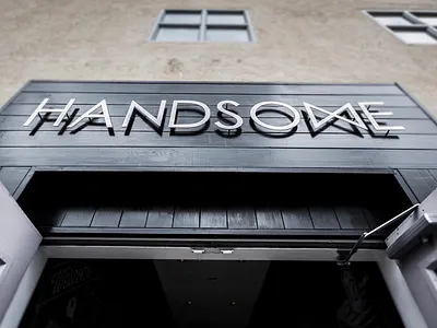 Handsome 5th street entrance handsome metal sign signage store front