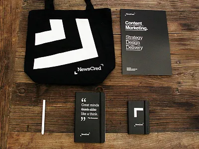 NewsCred Swag! bag content marketing marketing moleskin newscred notebook pen swag tote whitepaper