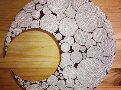 Crescent Handcut 800x600 black circles crescent cut hand drawn lines moon paper papercutting white