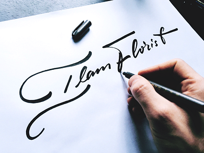 Ilam Florist brand. calligraphy flow flowers lettering logo signature type