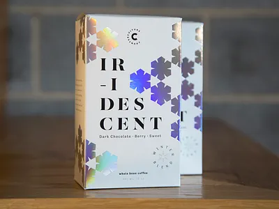 Iridescent 2017 christmas coffee foil holiday holographic packaging rainbows season snowflake winter