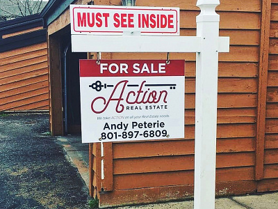 Action in Action action logo print real estate sign
