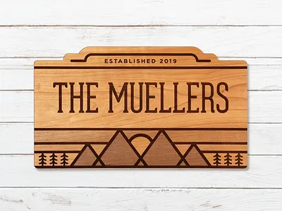 Sunrise Family Name Sign cherry environmental graphics evergreen illustration laser cut mountain name sign pine signage sunrise tree