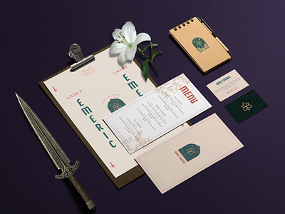Restaurant Identity System branding dagger flower identity lily logo menu restaurant