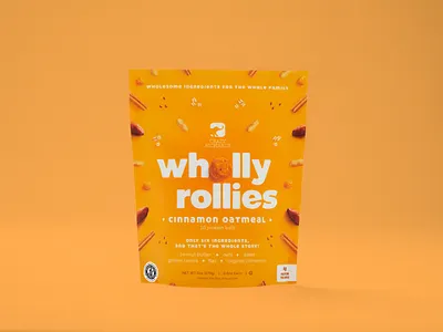 Wholly Rollies (Cinnamon Oatmeal) bag ball brand cinnamon dates design freezer frozen golden healthy logo oatmeal oats packaging peanut butter photography pouch protein raisin snack