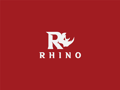Rhino Logo animal branding graphic design hunting letter logo letter rhino letter rhino logo power powerpoint r logo rhino rhino constriction rhino letter rhino logo rhino logos rhino r logo safari savannah strength typography