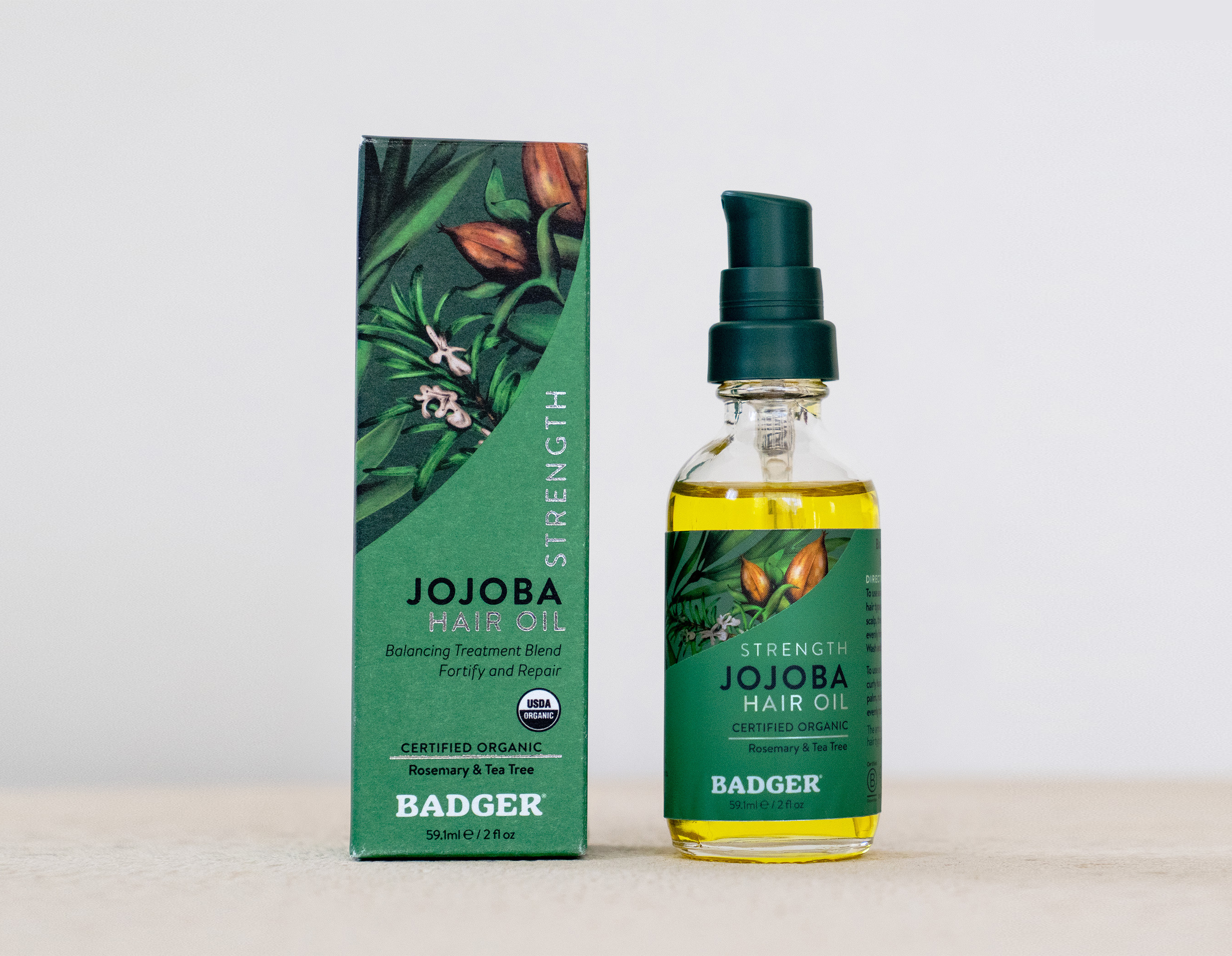 Badger Organic Jojoba Hair Oil Packaging beauty beauty packaging botanicals branding cosmetic packaging cosmetics graphic design haircare illustration label design oil organic package packaging packaging art packaging design packaging illustration product packaging product packaging design pump