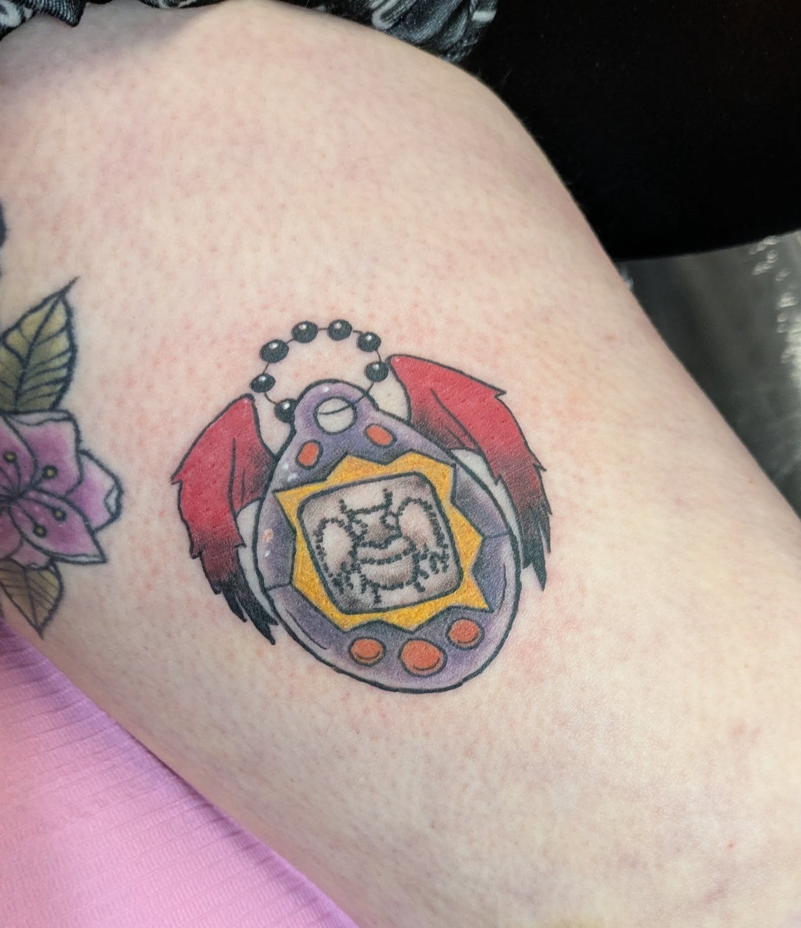 Tamagotchi. cryptid cryptids cryptidtattoo mothman tamagotchi tattoo tattoos