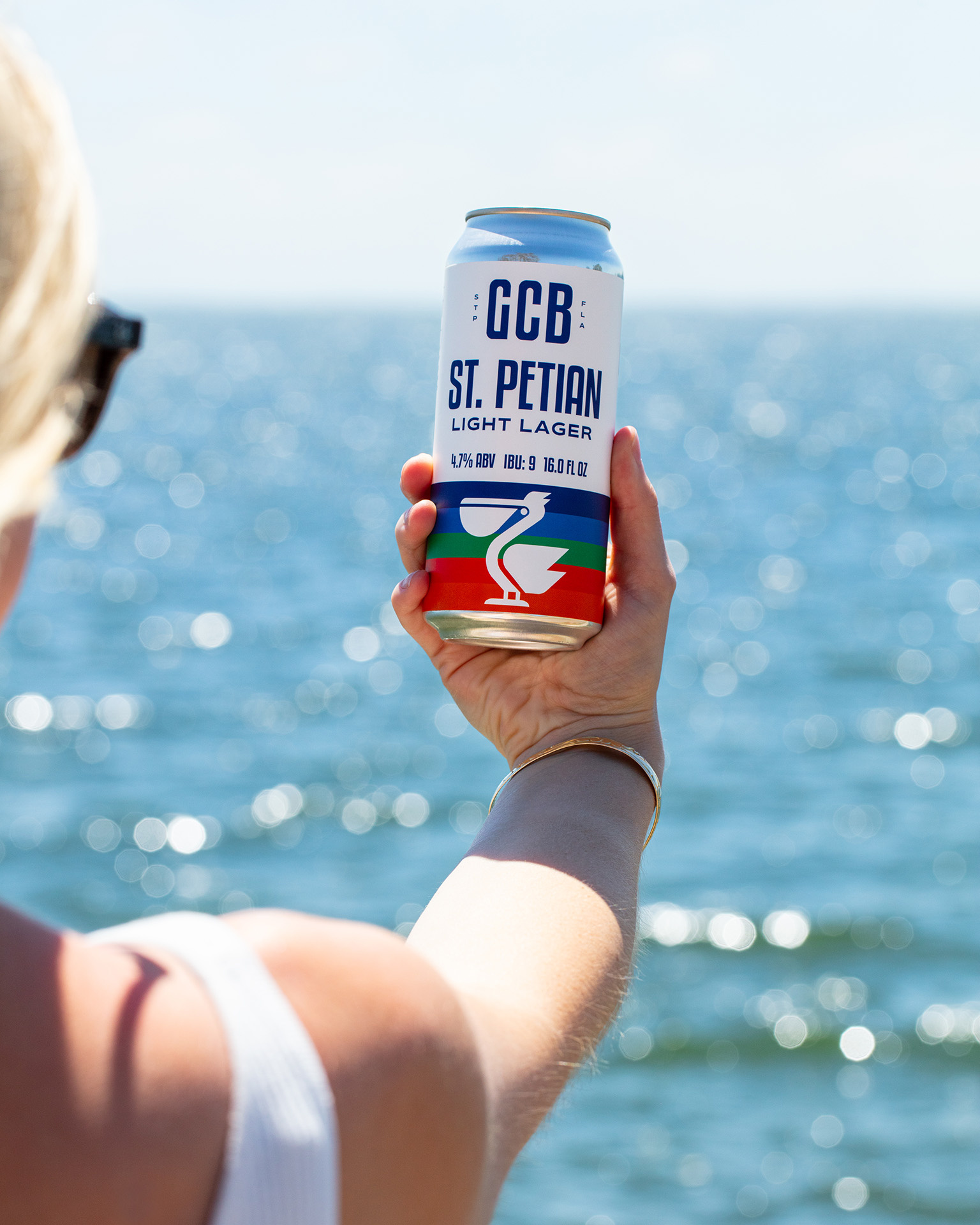 GCB St. Petian Light Lager Beer Can Packaging beer brand brand assets branding can concept creative design florida food graphic design illustration local logo logo design packaging packaging design stpete typography vector