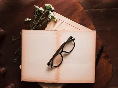 Top view of books and glasses 3d animation branding graphic design logo motion graphics top view of books and glasses ui