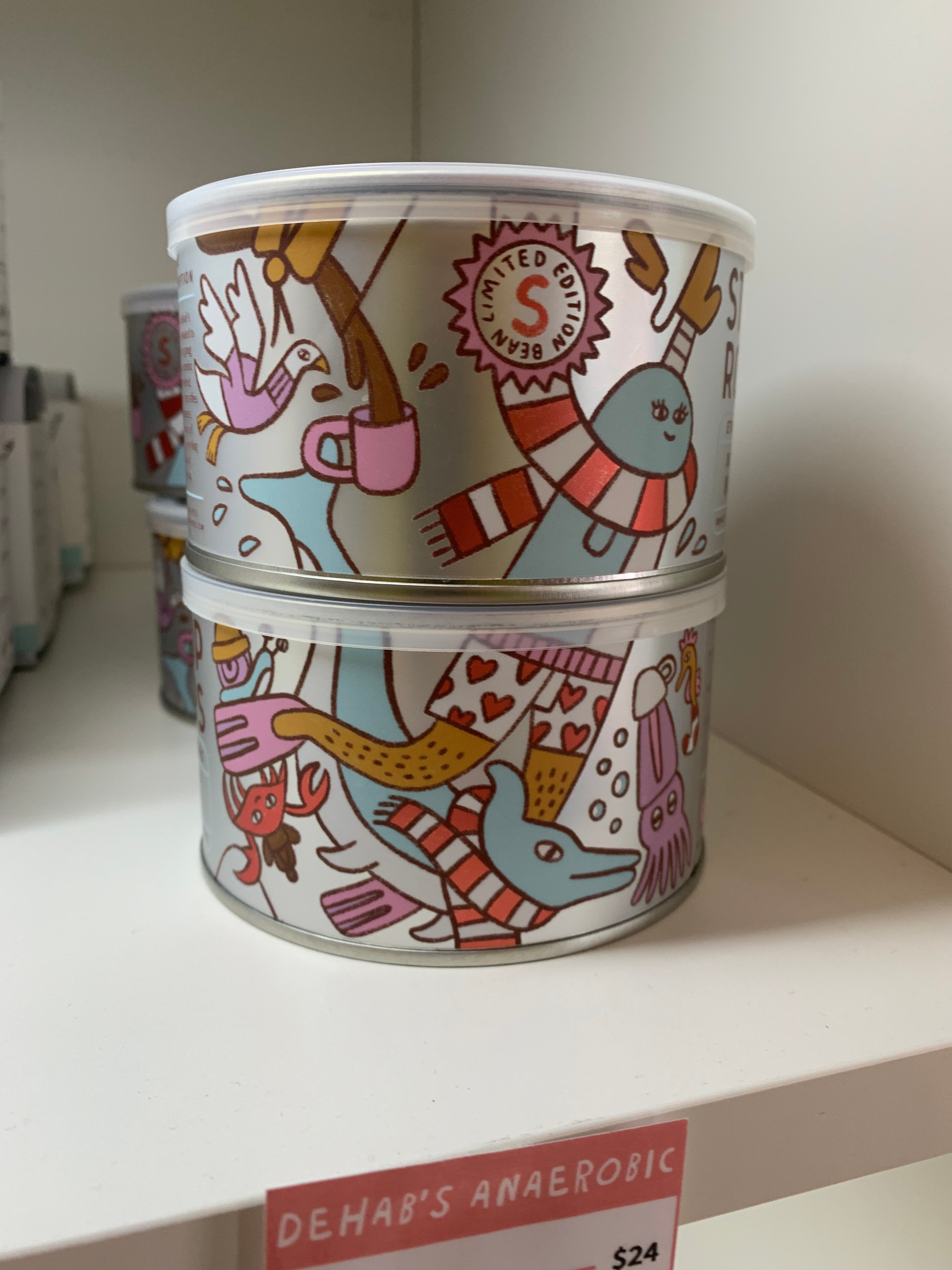 Norris and the Island of Misfit Knits cafe can coffee crab cute dolphin doodle narwal norris packaging roastery seagull silly swimming