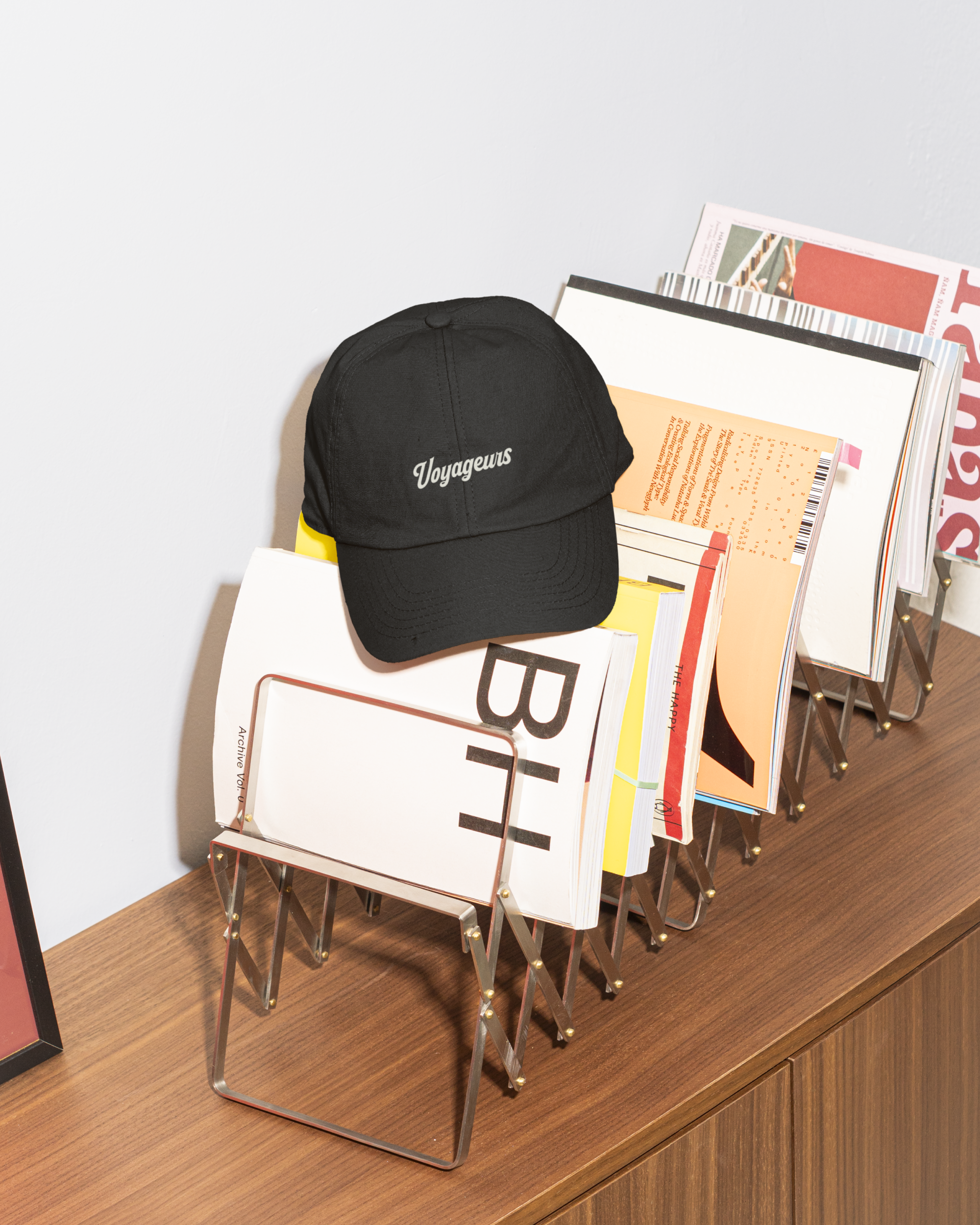 West Island College branding cap college hat high school logo merch retro script typography varsity vintage wordmark