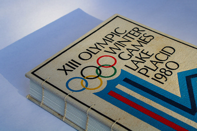 COPTIC STITCH UTILIZING UP-CYCLED 1980' WINTER OLYMPICS TOTE BAG bookbinding olympics sports upcycle winter