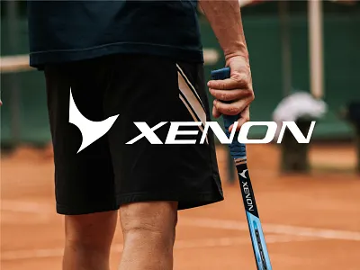 Xenon - Tennis Racket Brand Logo abstract logo best logo designers 2025 bird fly logo bird logo fitness logo racket racket brand logo sharp strong abstract logo sports brand sports lifestyle brand sports logo tennis brand tennis brand logo top 10 logo designers 2025 xenon