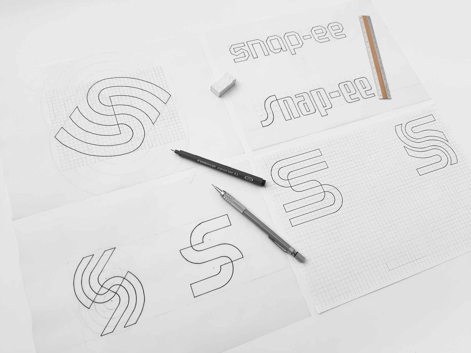 Preliminary Sketches of Identity Concepts Developed for Snap-ee bespoke bespoketype brand identity branding customtype drawing graphic design handcrafted handdrawn lettering logo logo design monogram sketch sketching wordmark