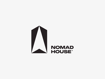 Nomad House v2 arrow compass direction house logo negative space nomad pointing workshops
