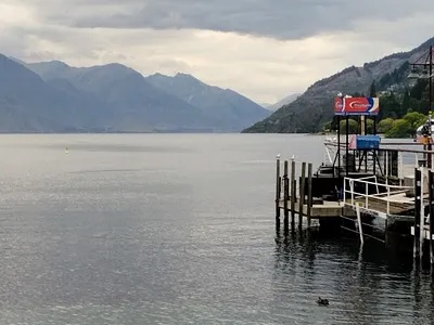 Still Waters, Silent Peaks adventure calm cloudy sky lake landscape mountains nature peaceful travel photography