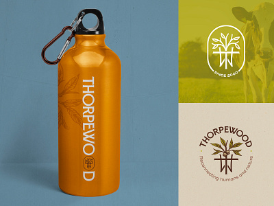 ThorpeWood blue bottle branding brown chestnut earthy environment farm green illustration landscape leaves logo natural nature thorpewood tree water wellness wood