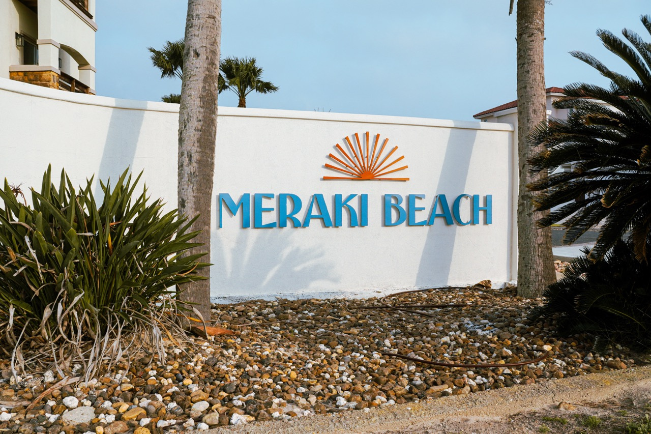 Meraki Beach Logo Design air bnb beach branding logo resort signage sun surf vacasa vacation wave
