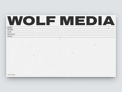 Wolf Media homepage bold branding gray typographic