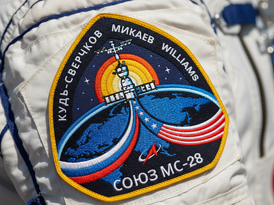 Soyuz MS-28 chevron emblem graphic design mission nasa roskosmos space