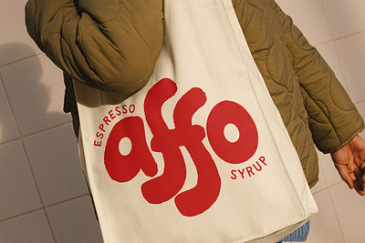 Tote Bag Design for Coffee Brand Affo bag brand brand identity branding coffee design design agency espresso graphic design hand drawn illustration lettering logo logos merchandise playful tote typography ux vector