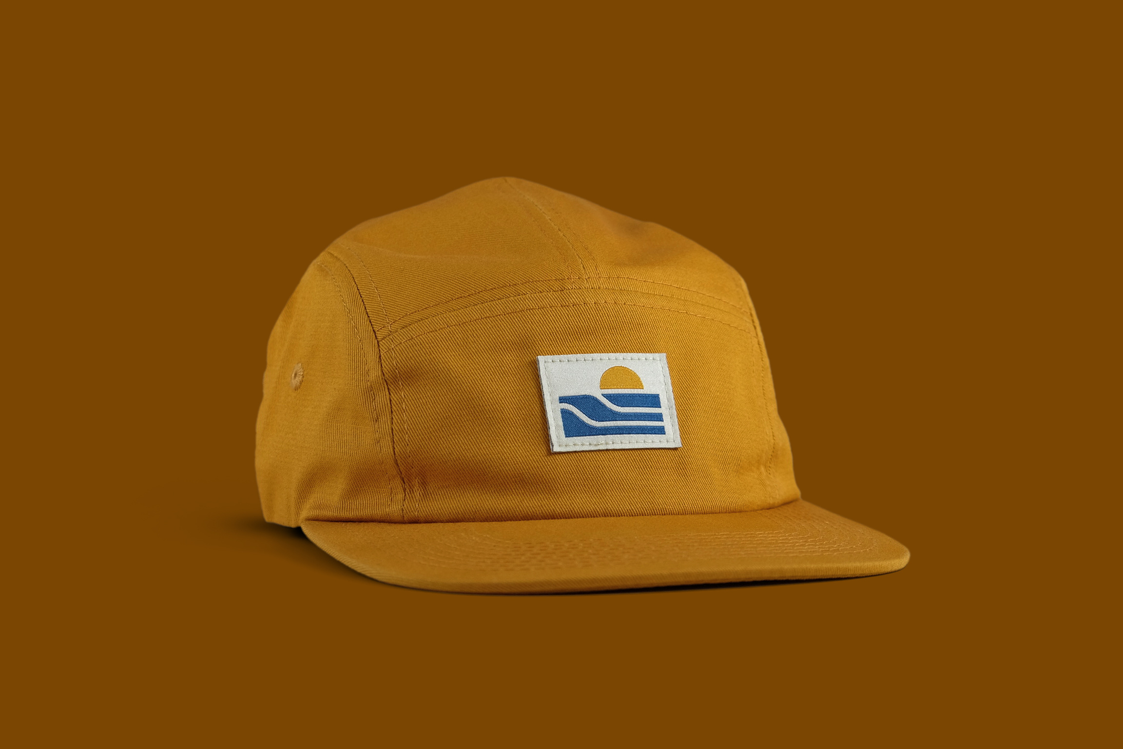‘Sol’ Camper Hat camper cap dan kuhlken design dkng dkng studios geometric hat illustration nathan goldman sol sun sunset vector waves woven patch