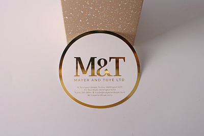 M&T Custom Gold Foil Stickers - StickerDot NZ branding business stationery custom stickers graphic design label design logo design luxury branding minimalist packaging print print design sticker design sticker printing stickers typography