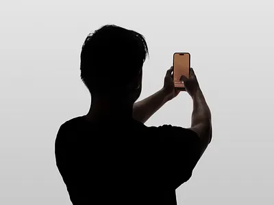 Man holding an iPhone at eye level app community design group interaction interactive iphone male minimal mobile mobile app mobile web model select subject swipe tap ui user ux