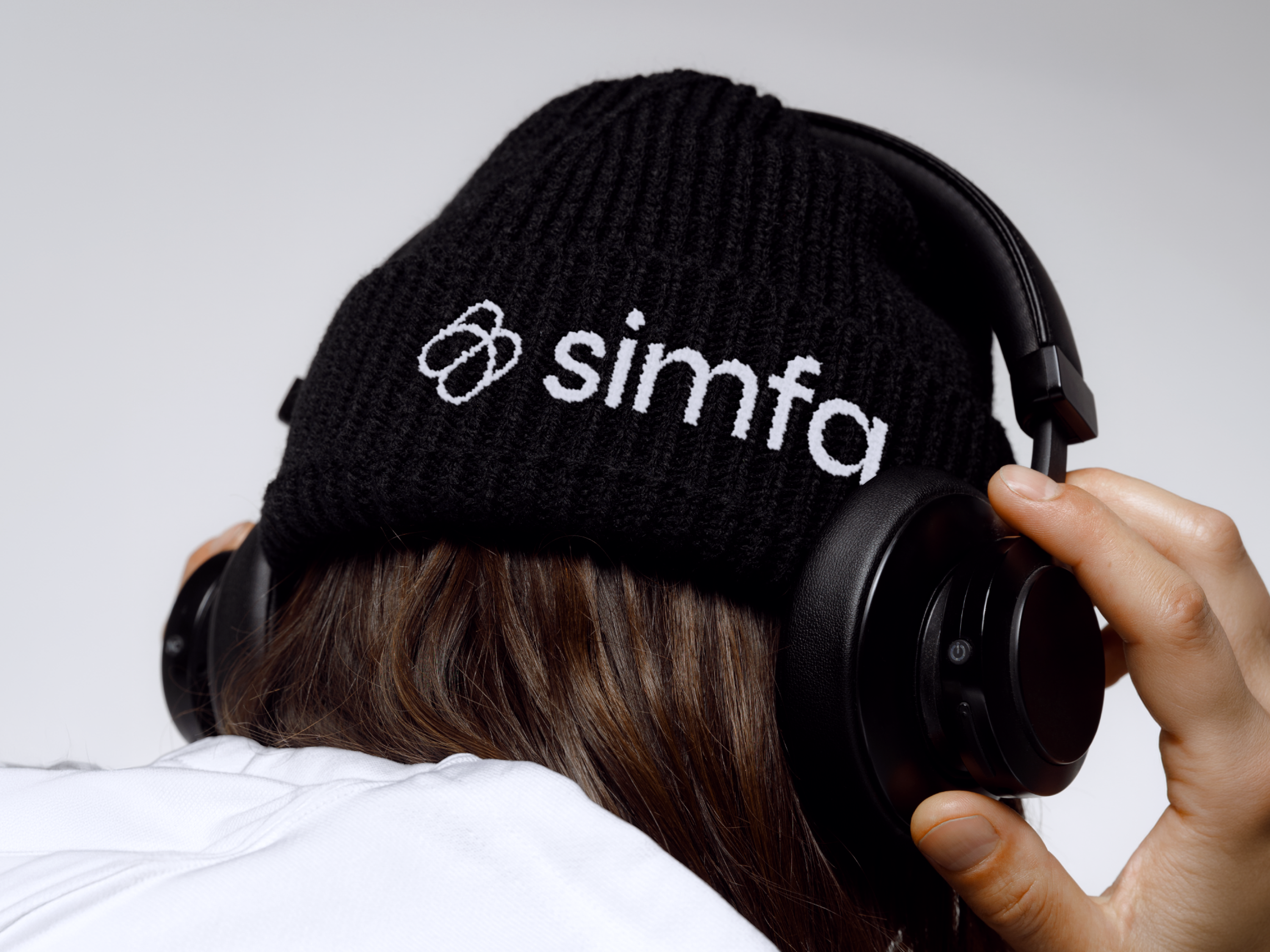 Simfa Logo — A Black Beanie creative logo embroidered geometric logo hat hat mockup headphones logo logo mockup logomark logotype minimalist logo s logo saas logo tech logo