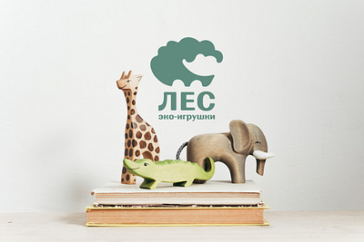 Logo for a brand of wooden eco-toys branding design ecology toy logo graphic design illustration logo logotype toy logo typography vector