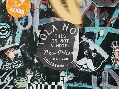 Tola Nola artist black and white brand design brand designer branding font lettering logo logo design logos mock up mockup new orleans sticker street traditional type typography urban wall