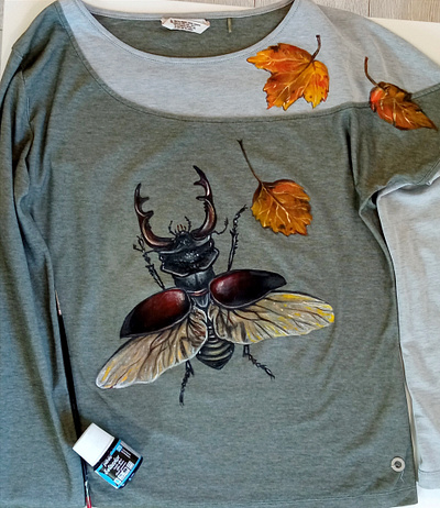 hand-painted sweatshirt with leaves and stag beetle design fashion graphic design hand painted painting style