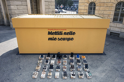 Mettiti nelle mie scarpe design exhibition design graphic design typography