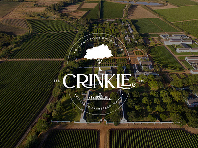 Crinkle Branding | A brand of organic products brand identity branding coat of arms emblem factory farm fruit graphic design graphic designer growing logo organic organic food organic food logo vegetables