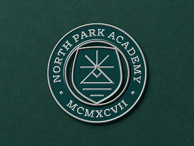 North Park Academy Logo & Pin Design academy badge branding education enamel pin icon identity logo minimal mountain nature north park pin rays school seal shield stamp sun