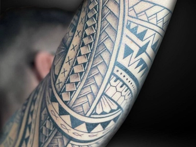 Half Sleeve Blackwork Tattoo in Polynesian Tribal Style, Bali tattoogoals