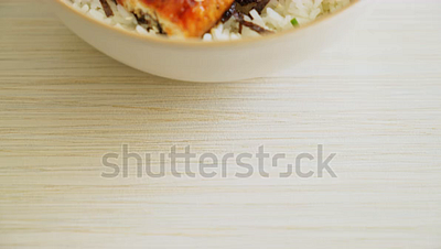 Eel rice bowl or unagi rice bowl - Japanese food style grilled eel