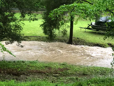 Rising creek boat flood water
