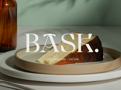 Bask. burnt. cheesecake logo art direction branding display food green logo photography