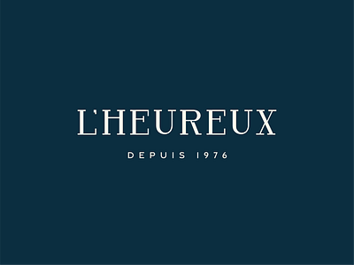WORDMARK LOGO FOR L'HEUREUX bespoke blue branding custom font logo luxury serif vector wordmark