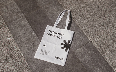 Realistic Totebag Mockup apparel bag canvas fabric fashion grocery hand bag mockup pouch product realistic shopping showcase street totebag urban